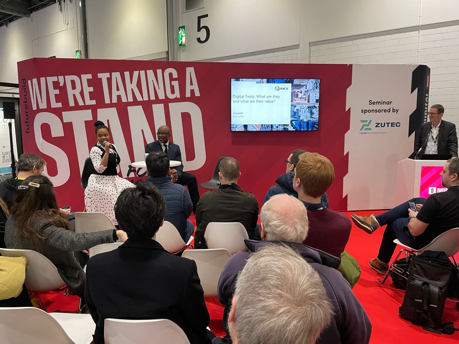 Dr Bonahis Oko participating in a sustainability panel at London Build Expo